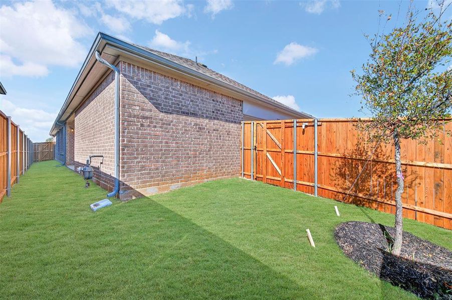 Exterior details and patio area of a home in Tarrytown, Crowley (Image 25).