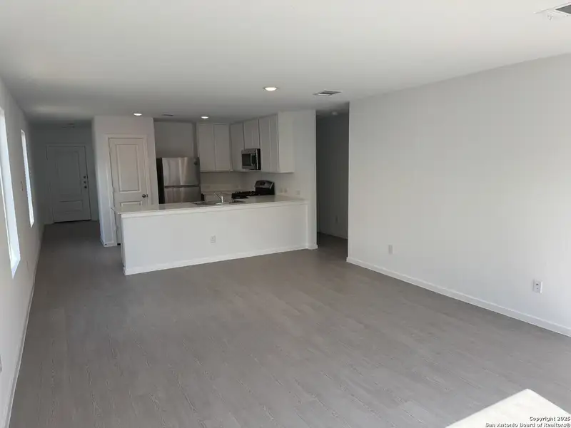 Spacious, unfurnished interior of a new home in Kyndwood: Cottage Collection, New Braunfels (Image 9). Spacious, unfurnished interior of a new home in Kyndwood: Cottage Collection, New Braunfels (Image 9).