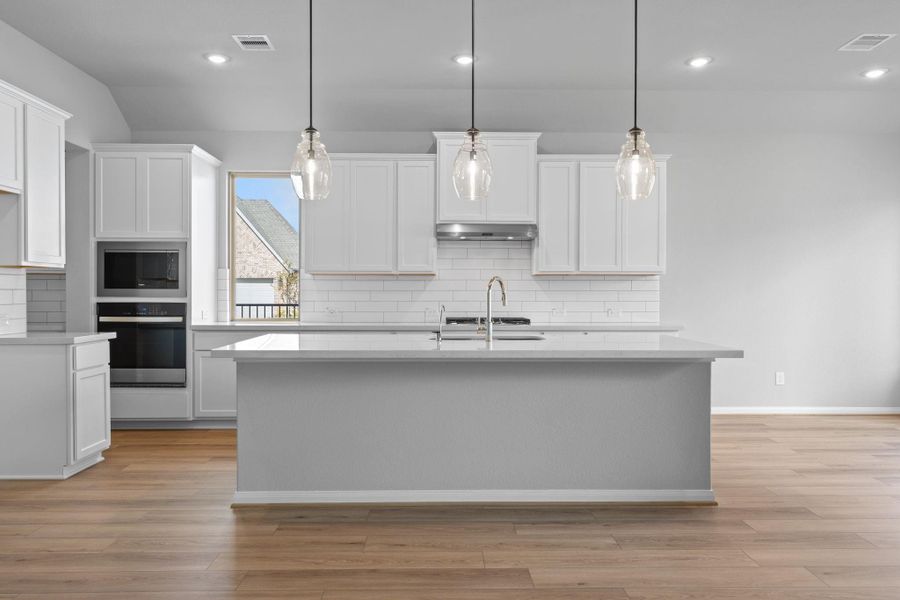 Furnished interior view inside a new home in Bridgeland 55', Cypress (Image 13).