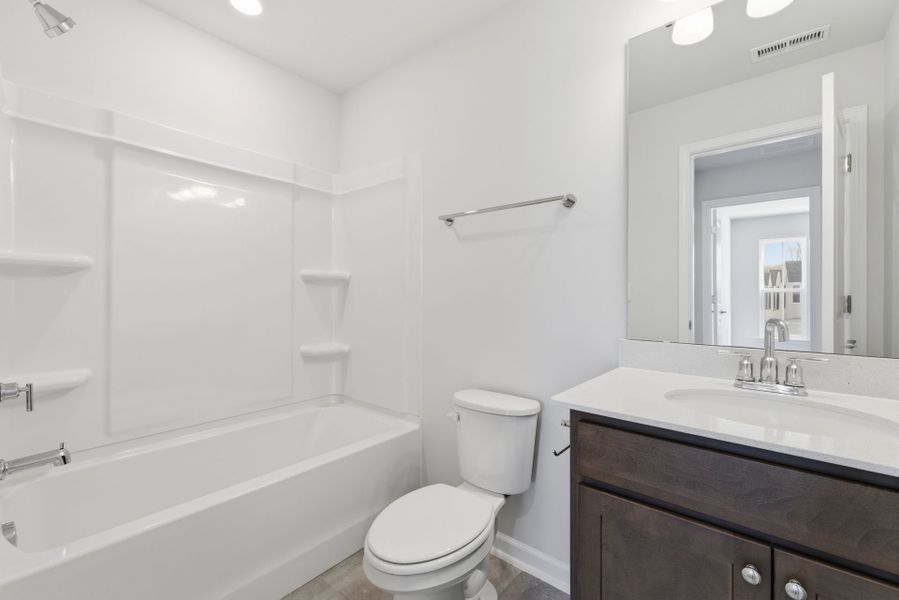 Furnished interior view inside a new home in Poets Walk, Whitsett (Image 12).