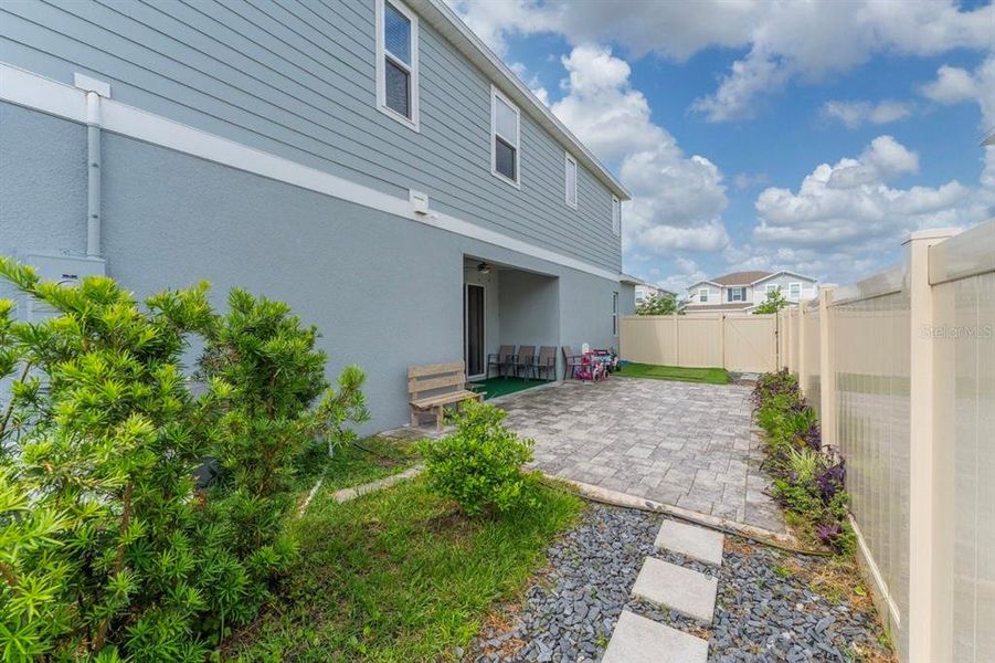 Exterior details and patio area of a home in Urban Collection at Big Sky, Kissimmee (Image 3).