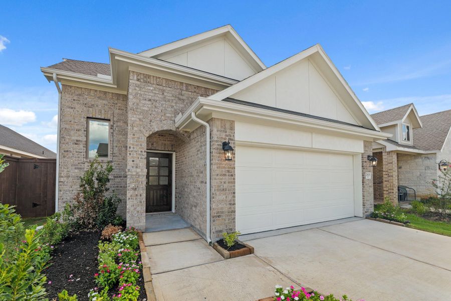 Exterior details and patio area of a home in The Trails, New Caney (Image 4).
