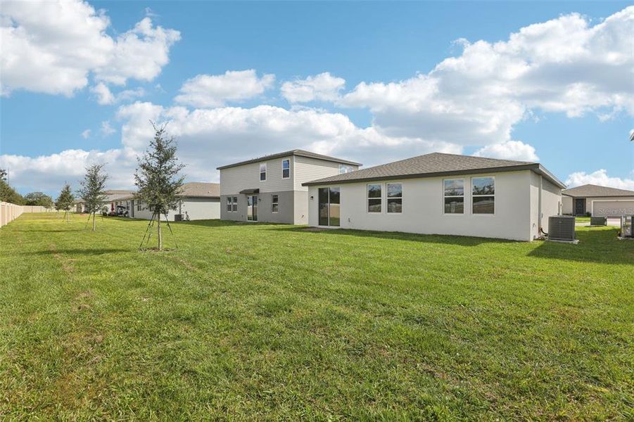 Exterior details and patio area of a home in Lawson Dunes - Signature Series, Haines City (Image 24).