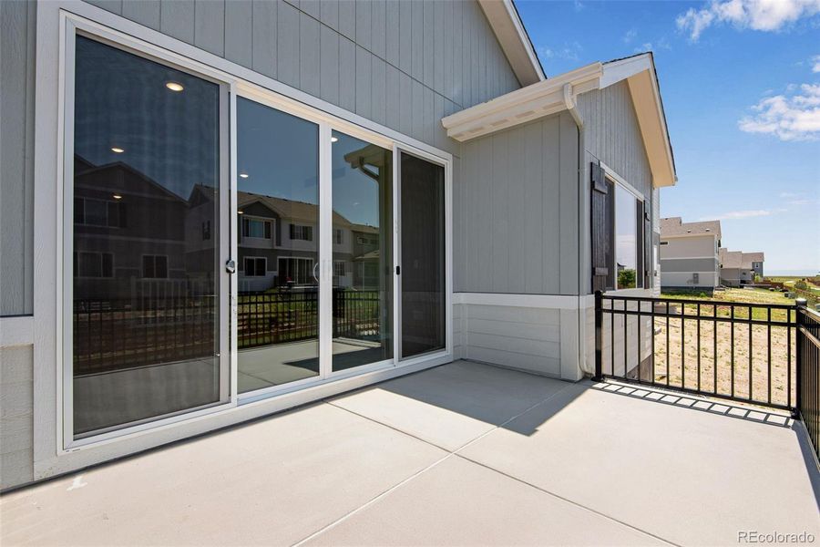 Exterior details and patio area of a home in Reunion Ridge, Commerce City (Image 29).