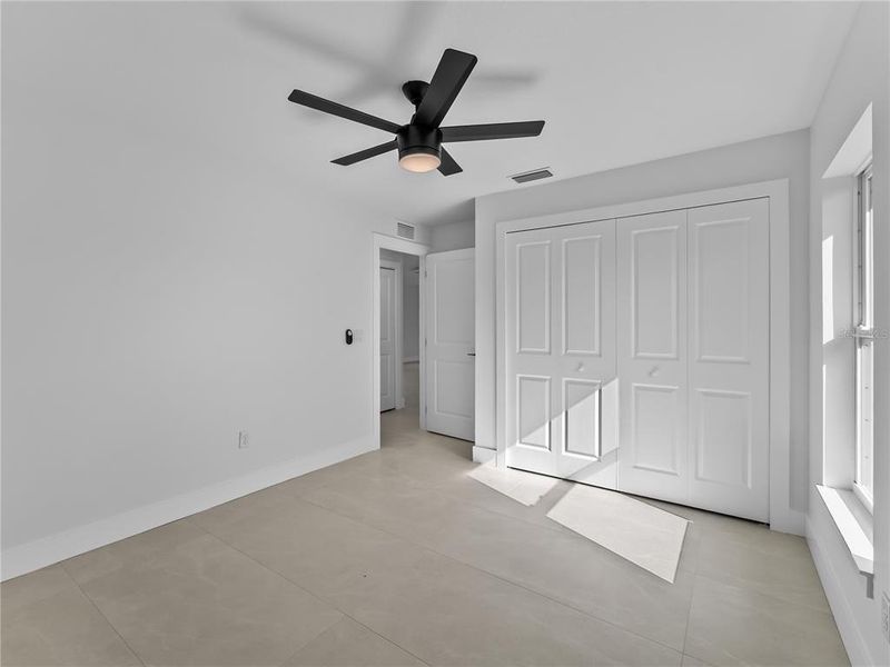 Spacious, unfurnished interior of a new home in , Port Charlotte (Image 19).