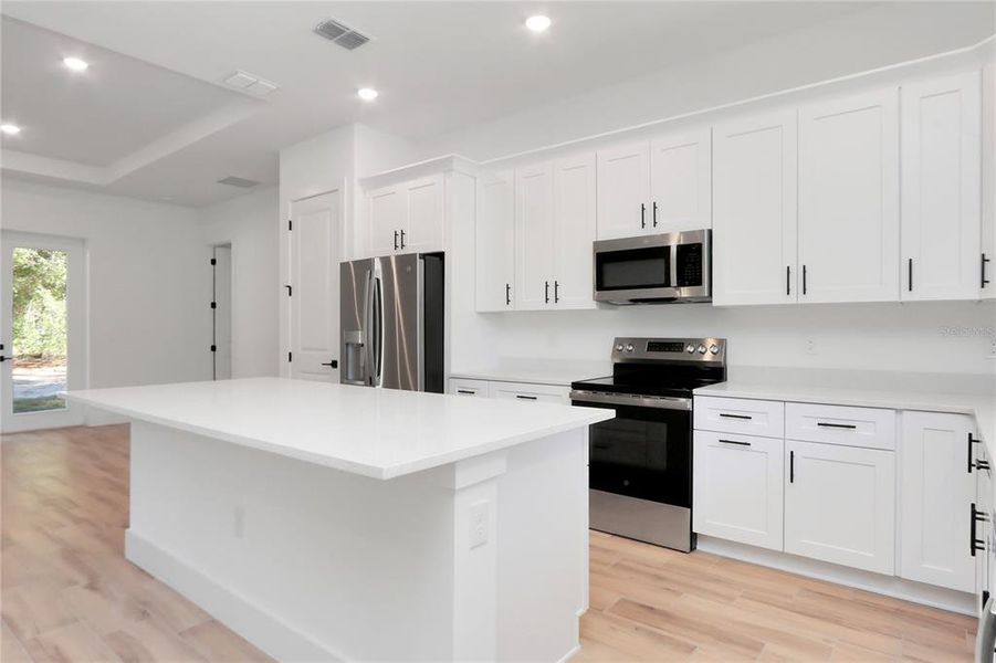 Furnished interior view inside a new home in , Ocala (Image 8).