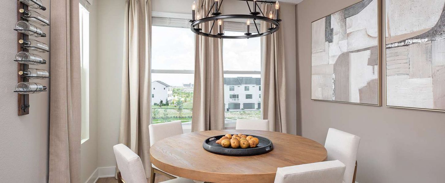 Representative furnished interior of a home built from the Haines II End Unit by Ashton Woods in Parkview at Hamlin, Winter Garden (Image 9).