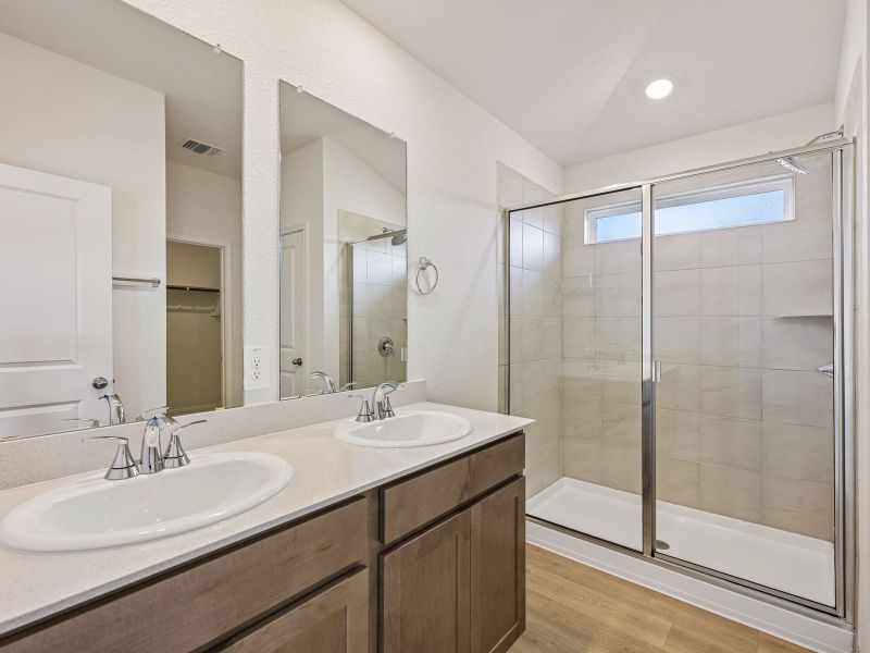 Furnished interior view inside a new home in Riverbend at Double Eagle - Reserve Collection, Cedar Creek (Image 5).