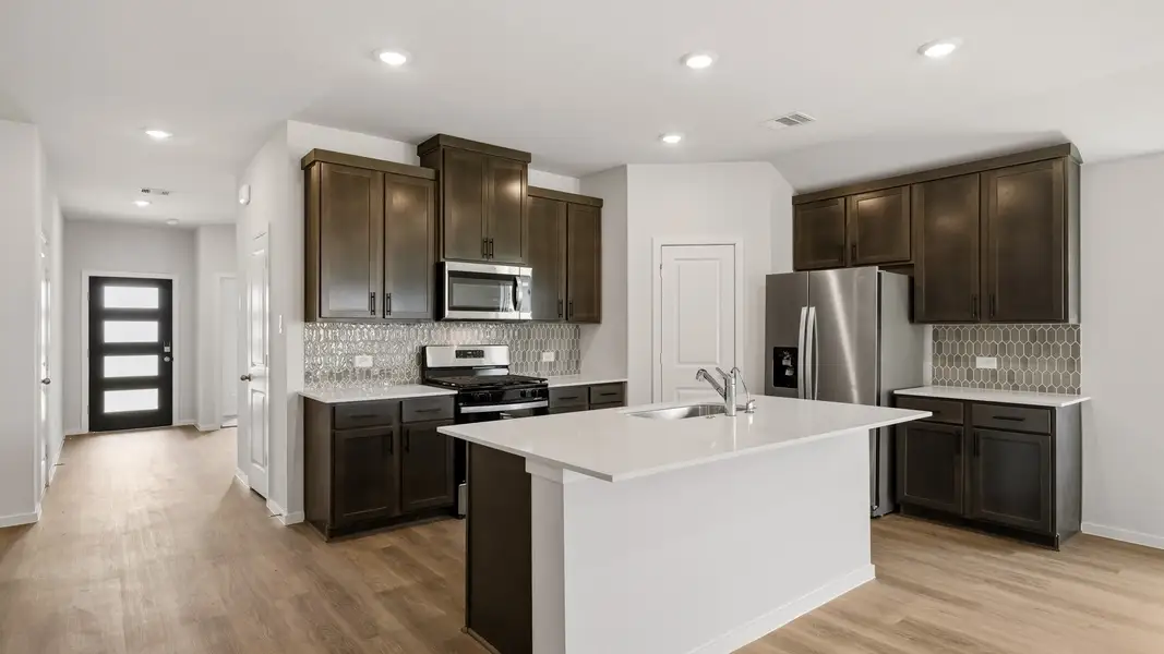 Furnished interior view inside a new home in Sunterra Lakes, Brookshire (Image 4).