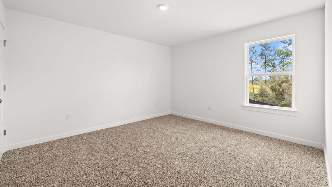 Spacious, unfurnished interior of a new home in Magnolia at the Bluffs Phase 3, Freeport (Image 16).