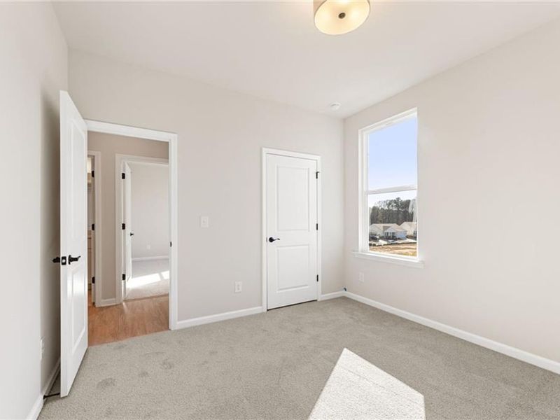 Spacious, unfurnished interior of a new home in Kelly Preserve, Loganville (Image 17).