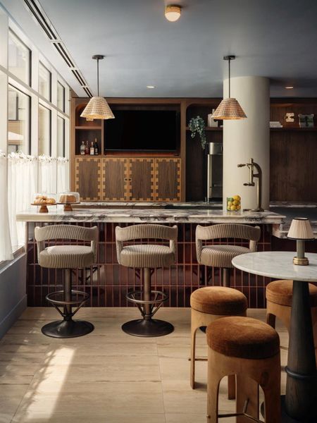 Unwind in the first floor lounge operated by Cuvée Coffee and Cocktails.
