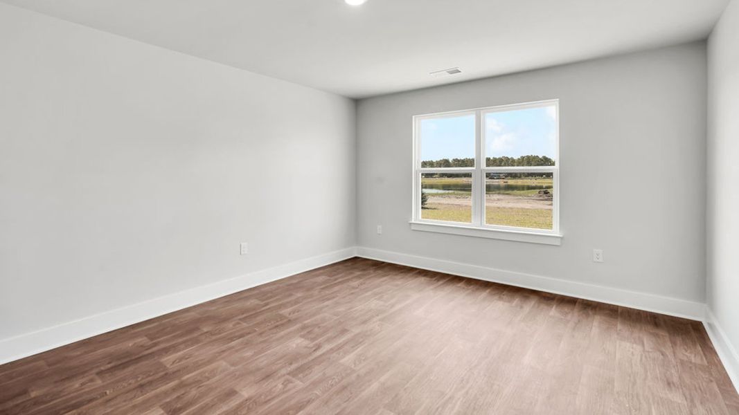 Spacious, unfurnished interior of a new home in Sidbury Station, Castle Hayne (Image 25).