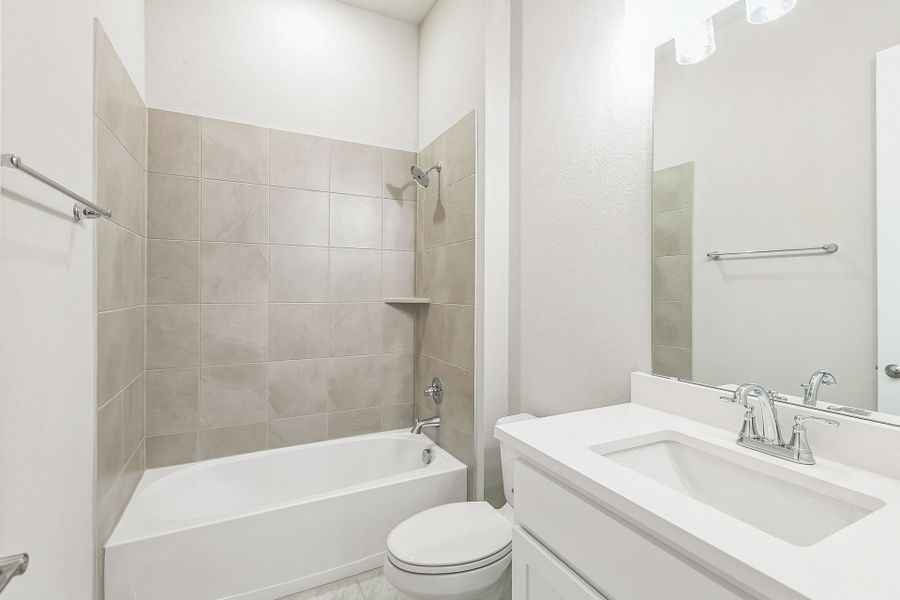 Representative furnished interior of a home built from the Harrison by GFO Home in Bluffview Reserve, Leander (Image 5).