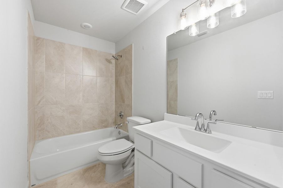 Furnished interior view inside a new home in Flora, Hutto (Image 12).