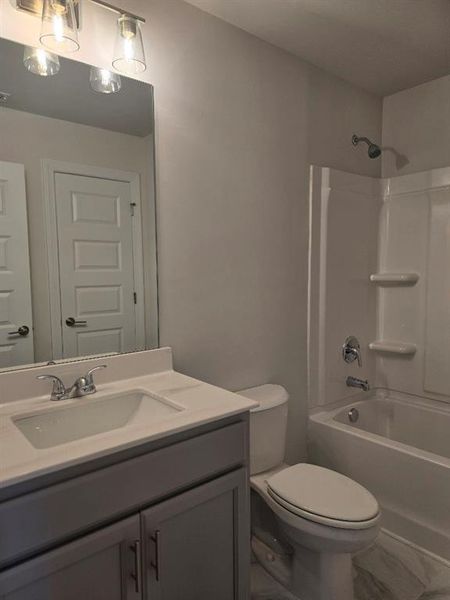 Furnished interior view inside a new home in Waters Edge, Mansfield (Image 9).