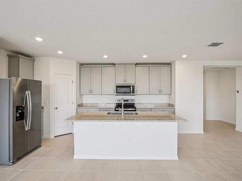 Furnished interior view inside a new home in The Reserve at Hammock Oaks - Signature Series, Lady Lake (Image 4).