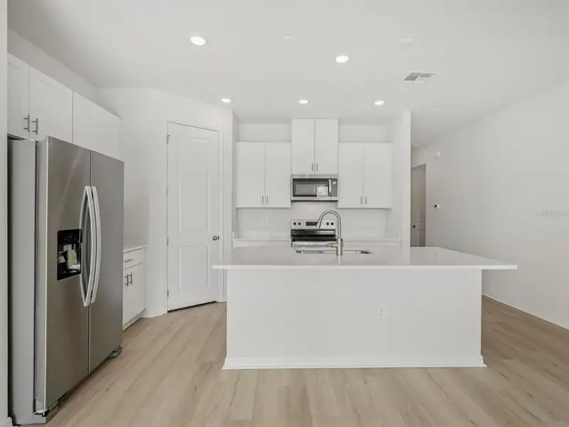 Furnished interior view inside a new home in Coasterra - Reserve Series, Palmetto (Image 4).
