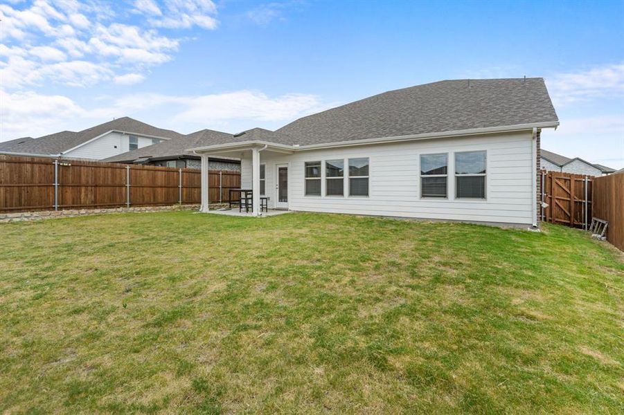 Front exterior of a new home in Cibolo Hills, Fort Worth, TX, highlighting curb appeal (Image 22). Front exterior of a new home in Cibolo Hills, Fort Worth, TX, highlighting curb appeal (Image 22).