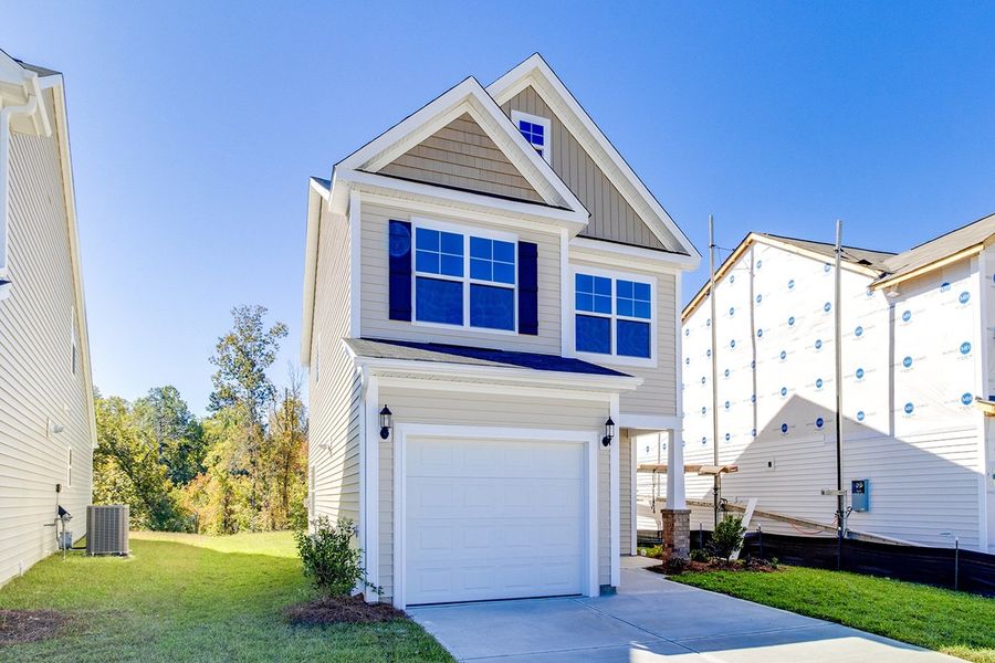 Front exterior of a new home in The Falls, Blythewood, SC, highlighting curb appeal (Image 2).