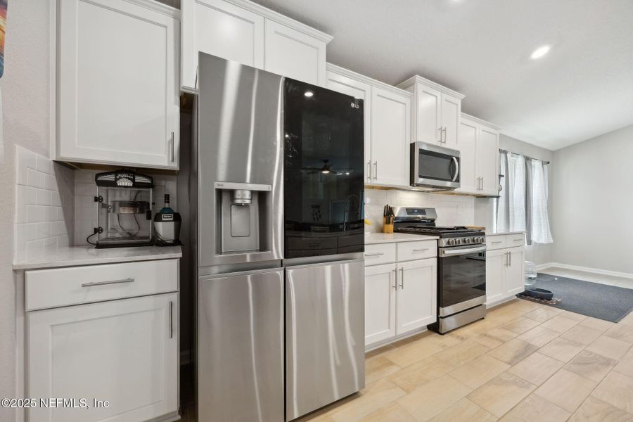 Furnished interior view inside a new home in Pecan Ridge, Jacksonville (Image 12).