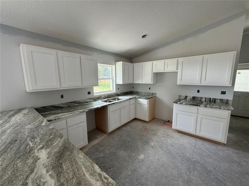 Furnished interior view inside a new home in , Lake Panasoffkee (Image 14).