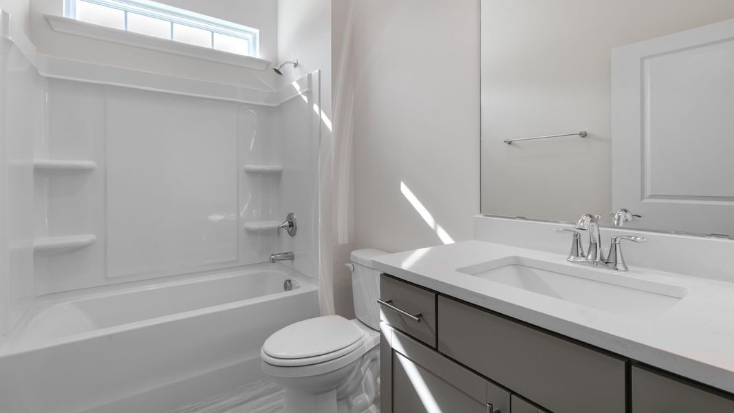 Representative furnished interior of a home built from the AZALEA by D.R. Horton in The Villas at Kinsley, Jamestown (Image 7). Representative furnished interior of a home built from the AZALEA by D.R. Horton in The Villas at Kinsley, Jamestown (Image 7).