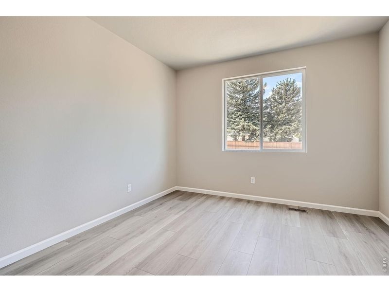 Spacious, unfurnished interior of a new home in Farmstead, Berthoud (Image 41).