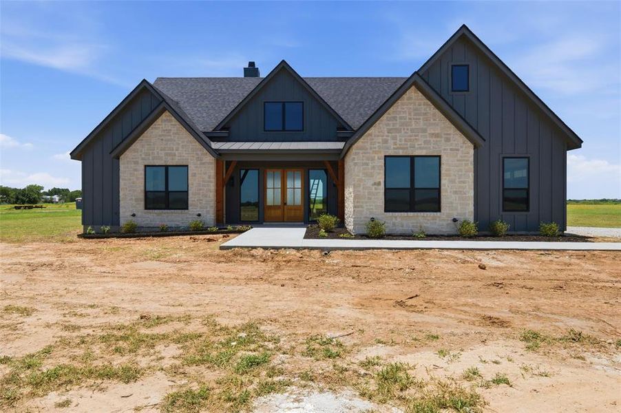 Front exterior of a new home in , Elm Mott, TX, highlighting curb appeal (Image 1). Front exterior of a new home in , Elm Mott, TX, highlighting curb appeal (Image 1).