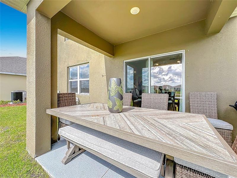 Exterior details and patio area of a home in Cypress Bay West, Palm Bay (Image 29).
