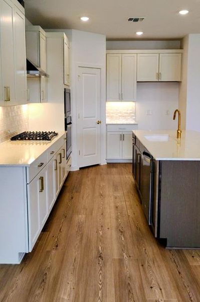 Furnished interior view inside a new home in Wolf Ranch, Georgetown (Image 7).