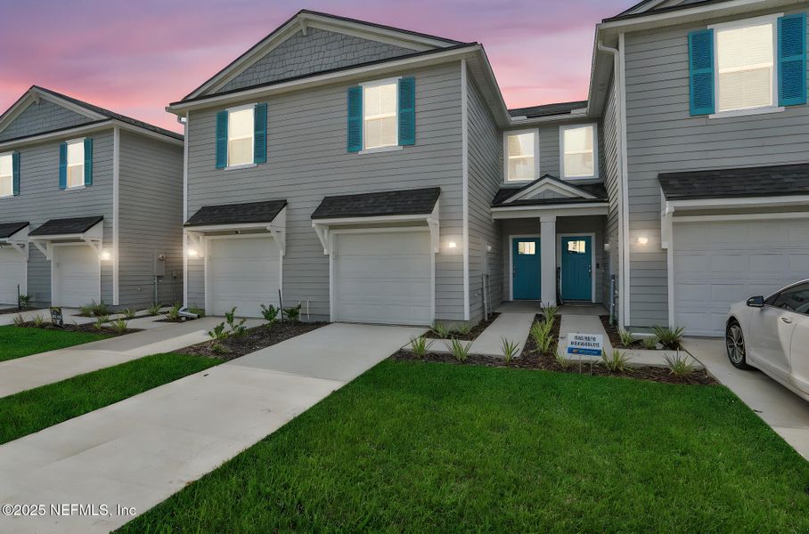 Exterior details and patio area of a home in Atlantis Pointe, Middleburg (Image 3).