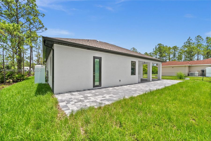 Exterior details and patio area of a home in , Naples (Image 26). Exterior details and patio area of a home in , Naples (Image 26).