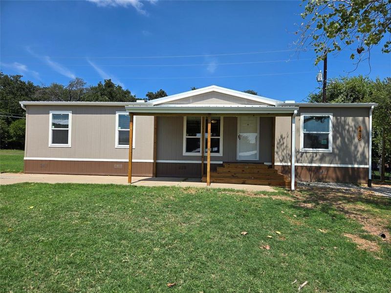 Exterior details and patio area of a home in , Pelican Bay (Image 3).