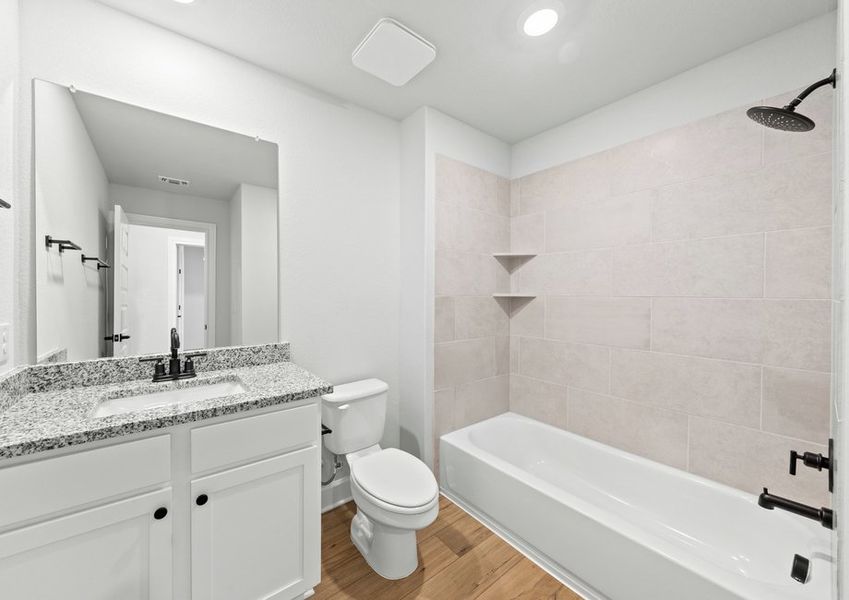Spacious secondary bathrooms.