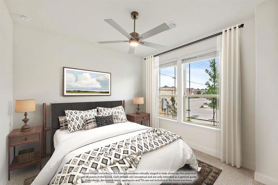 Bedroom with ceiling fan, large windows, carpet flooring, and patterned bedding on a queen bed