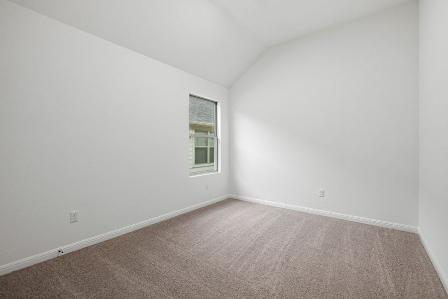 Bedroom in the Quartz home plan by Trophy Signature Homes – REPRESENTATIVE PHOTO