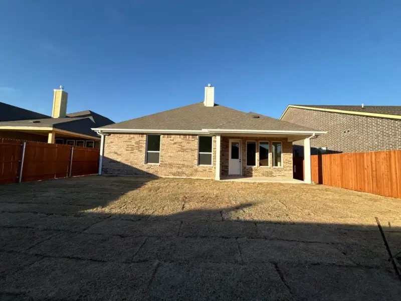 Exterior details and patio area of a home in Morningstar, Aledo (Image 3).