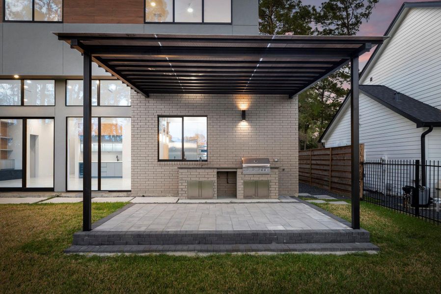 Exterior details and patio area of a home in , The Woodlands (Image 34).