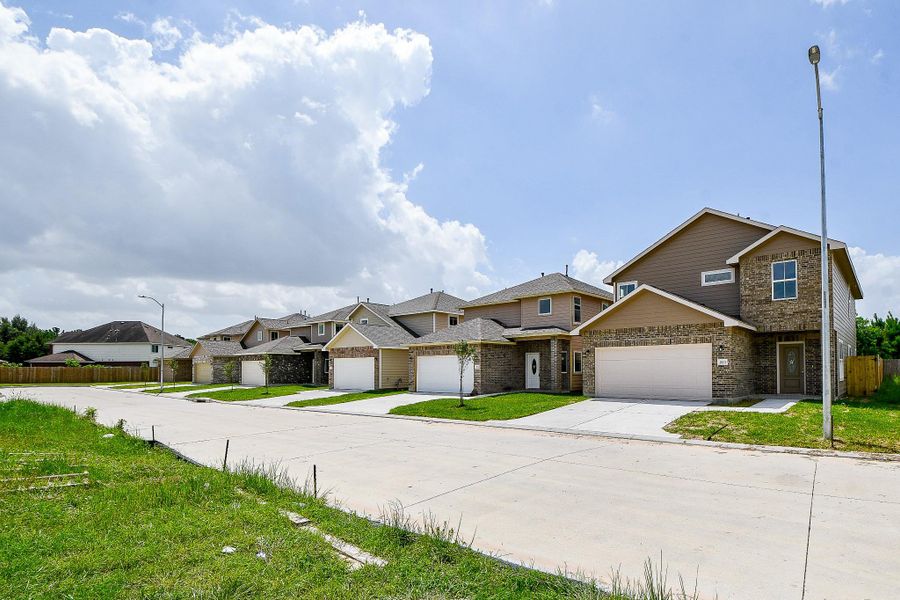 Front exterior of a new home in , Houston, TX, highlighting curb appeal (Image 19). Front exterior of a new home in , Houston, TX, highlighting curb appeal (Image 19).