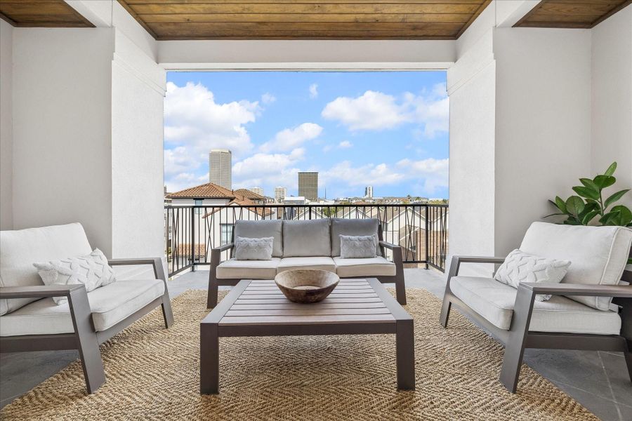The covered terrace off of the City Room has plenty of room for relaxing furniture or a dining table. Pre-wired with gas and water for outdoor kitchen, as well as for speakers and TV, this will soon become a favorite spot.