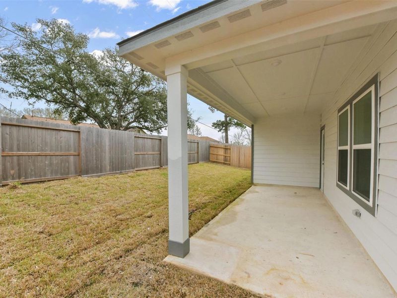Exterior details and patio area of a home in Windmill Estates, Magnolia (Image 2). Exterior details and patio area of a home in Windmill Estates, Magnolia (Image 2).