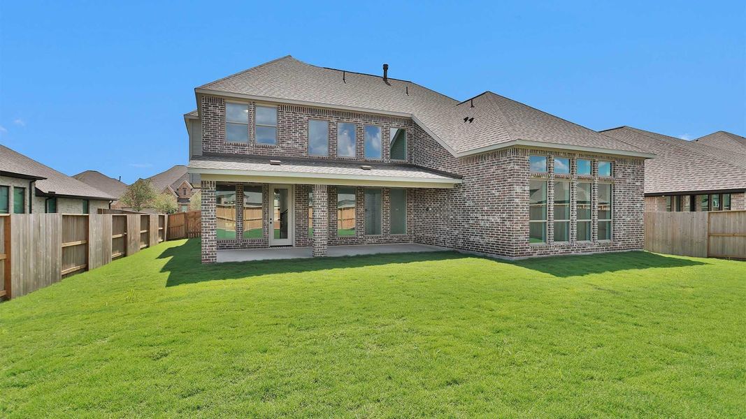 Exterior details and patio area of a home in Meridiana, Manvel (Image 3).