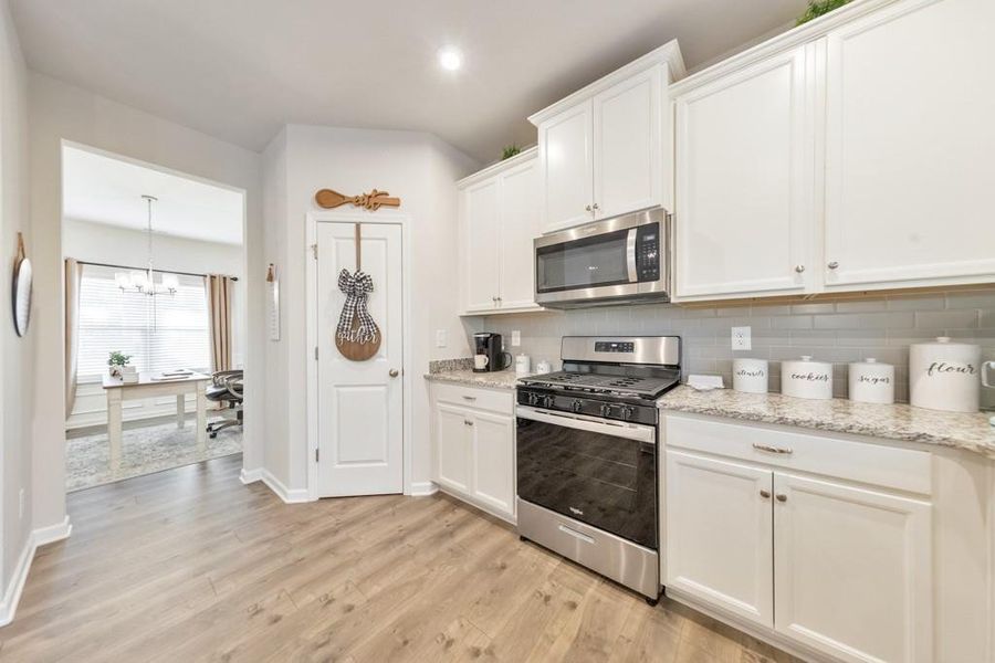 Furnished interior view inside a new home in Old Lost Mountain Estates, Powder Springs (Image 31).