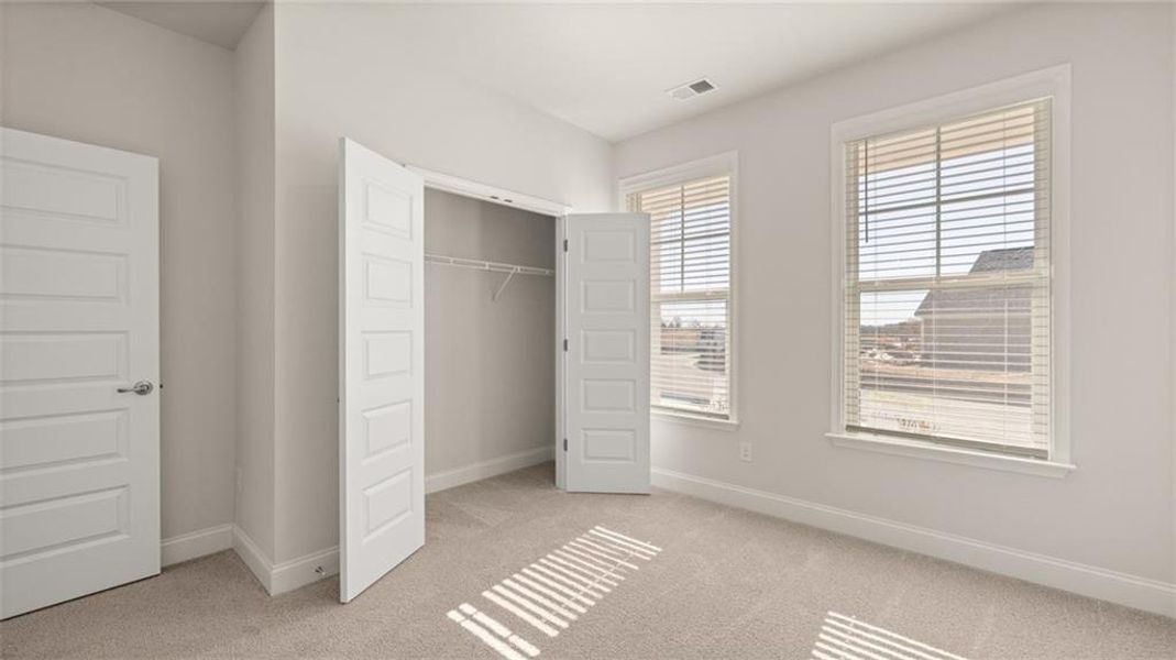 Spacious, unfurnished interior of a new home in Oak Ridge Meadows - Active Adult, Locust Grove (Image 18).