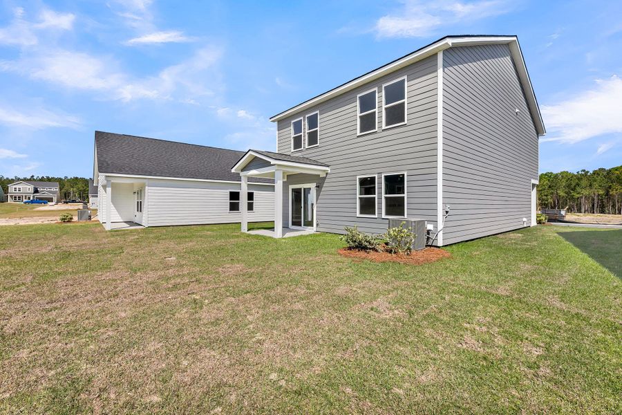 Exterior details and patio area of a home in Tea Farm, Ravenel (Image 23).