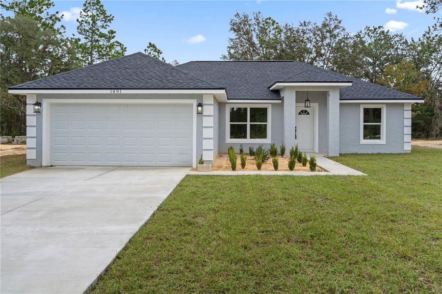 Front exterior of a new home in , Williston, FL, highlighting curb appeal (Image 1). Front exterior of a new home in , Williston, FL, highlighting curb appeal (Image 1).