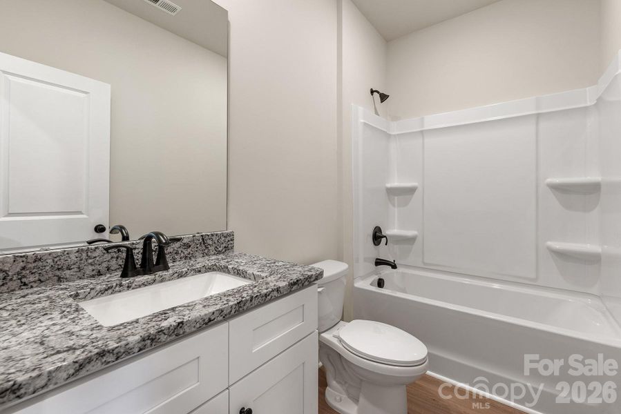 Furnished interior view inside a new home in Ascot Woods, Charlotte (Image 7).