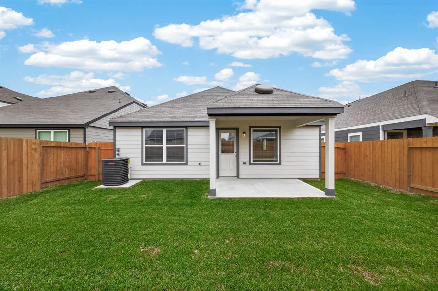 Exterior details and patio area of a home in Wayside Village, Houston (Image 26).