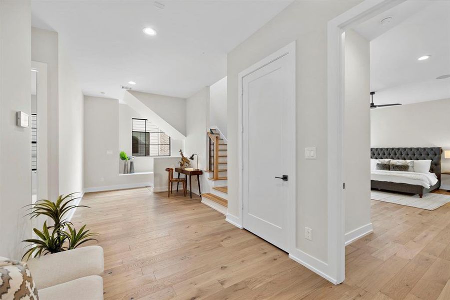 The second floor landing is a room to itself! Elevator closet behind the door.